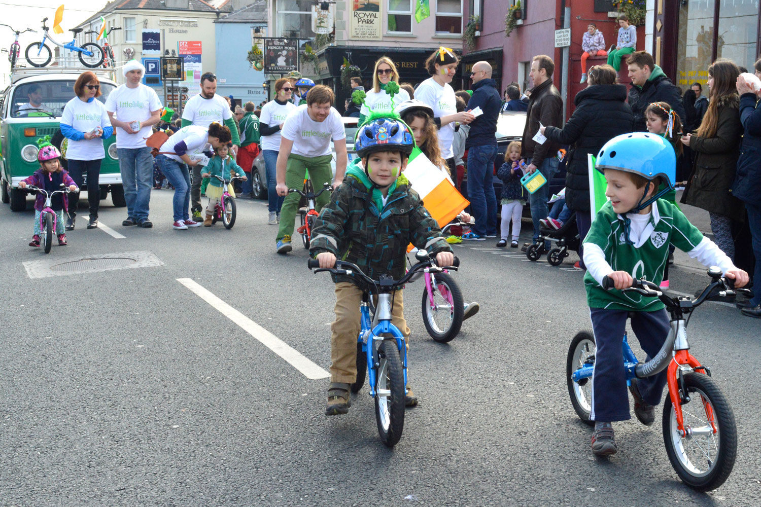 Kids on their balance bike as the St.Patrick's parade